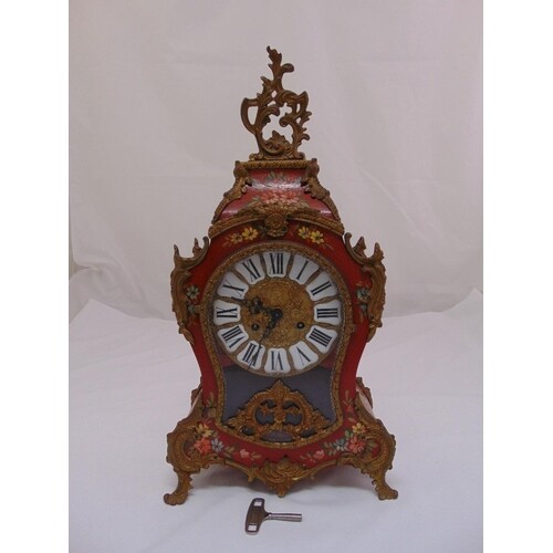 A continental mantle clock, shaped rectangular, the enamel d...
