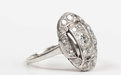 A diamond oval cluster ring in a panel shaped design, mounted with circular cut diamonds, the princi