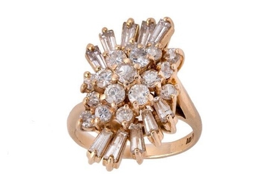 A diamond ring, of cluster design set with brilliant-cut and baguette diamonds, ring size K