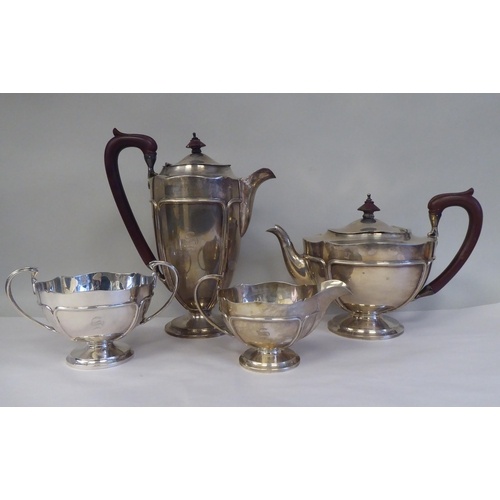 A four piece silver tea set, comprising a teapot of pedestal...