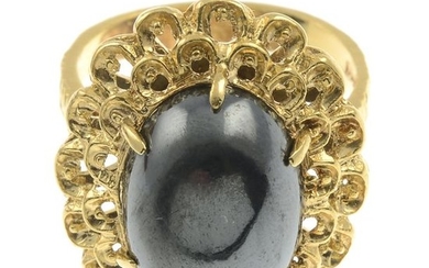 A hematite single-stone ring.Stamped 750. Ring size J....