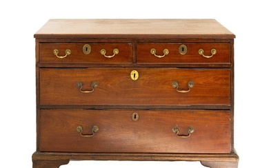 A late George III mahogany chest. Of two short and two long ...