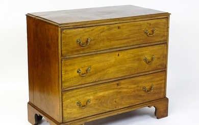 A late Georgian mahogany chest of drawers with a rectangular...