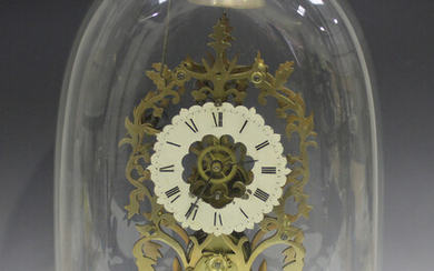 A late Victorian brass skeleton clock with eight day single fusee movement striking hours on a bell