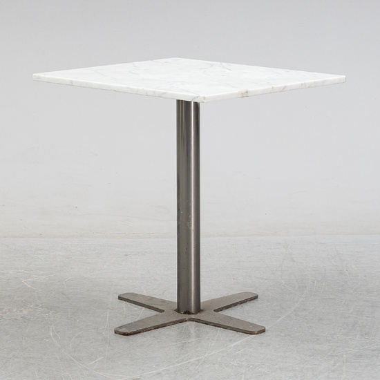 A marble top table, 21th century.