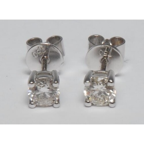 A pair of 18ct white gold diamond stud earrings, 0.40ct tota...