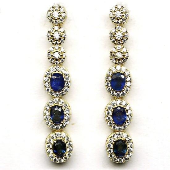 A pair of 925 silver gilt drop earrings set with oval cut sapphires and white stones, L. 3.5cm.