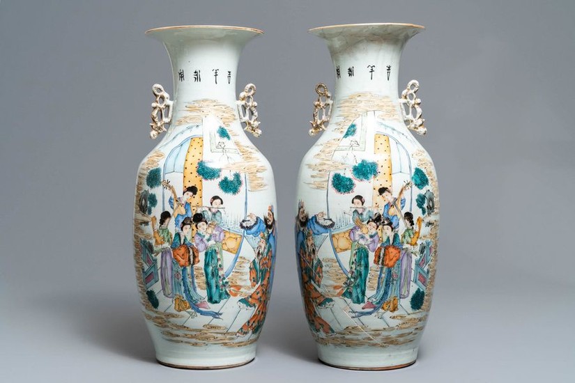 A pair of Chinese famille rose vases with...