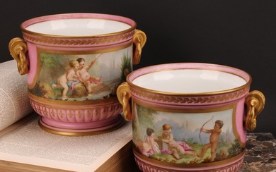 A pair of French porcelain ice pails or jardinieres, painted...