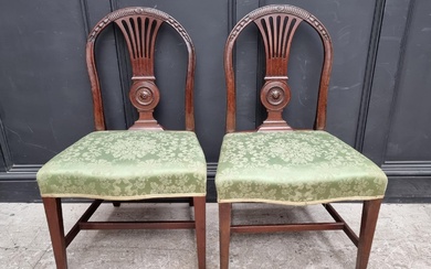 A pair of George III mahogany dining chairs. (2)...