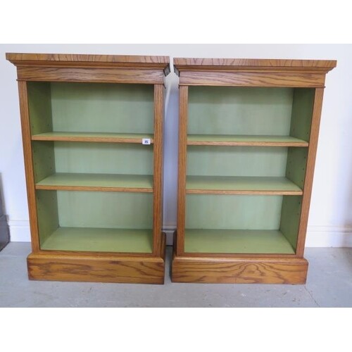 A pair of burr oak open bookcase with adjustable shelves and...