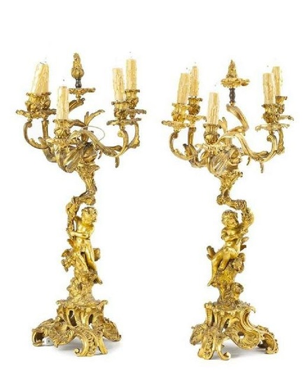 A pair of gilt bronze candelabra
