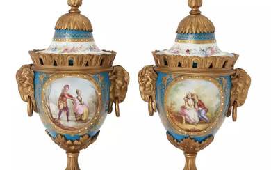 A pair of gilt-bronze mounted Sevres style vases and covers,...