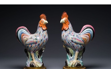 A pair of large Chinese famille rose models of roosters with...