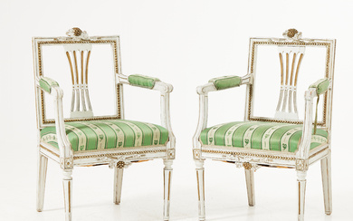 A pair of late Gustavian West Sweden armchairs.