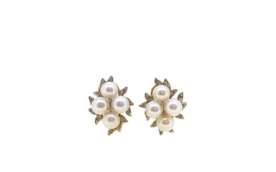 A pair of pearl and diamond ear studs