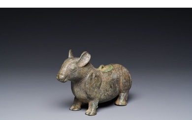 A rare Chinese bronze ritual vessel in the form of a tapir i...