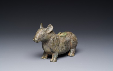 A rare Chinese bronze ritual vessel in the form of a tapir in Eastern Zhou-style,...