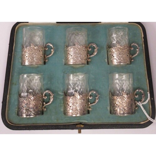A set of six Edwardian cut crystal cylindrical tot glasses, ...