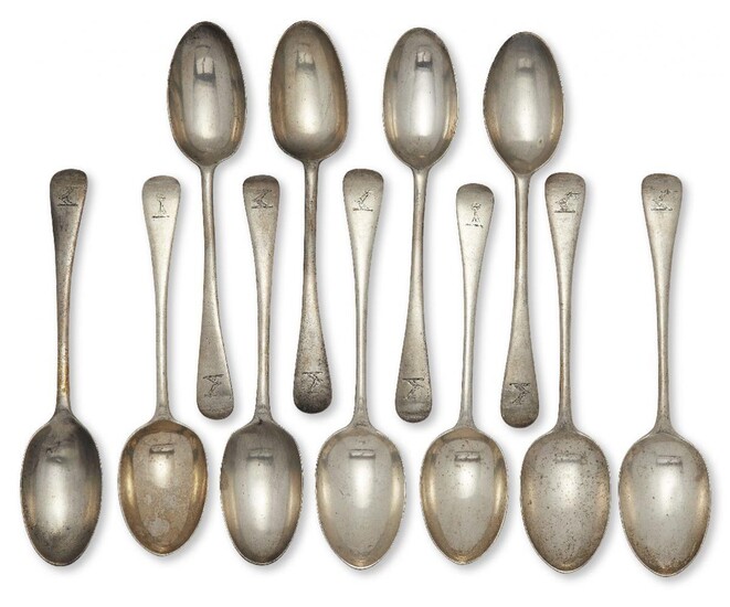 A set of six Victorian silver table spoons, London, c.1899, Josiah Williams & Co, and three table spoons with similar armorial, London, c.1897, Holland, Aldwinckle & Slater, all of old pattern design with armorial designed as a raised arm, together...