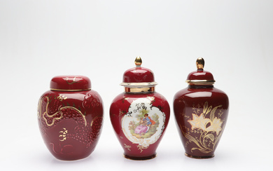 A set of three porcelain urns by Charlotte Rhead, Bursley Ware, England.