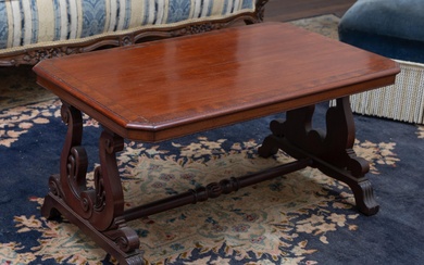 A shaped rectangular mahogany coffee table with lyre supports, Height 44cm x Width 84cm x Depth 52cm