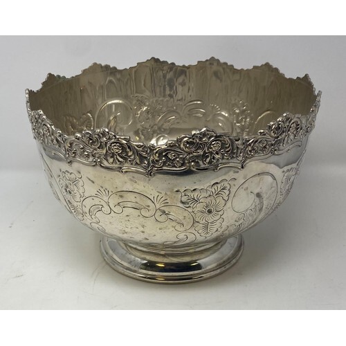 A silver plated punch bowl, with floral decoration, 31 cm di...