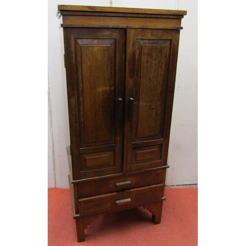 A small rosewood cabinet in an Art Deco design, the front el...