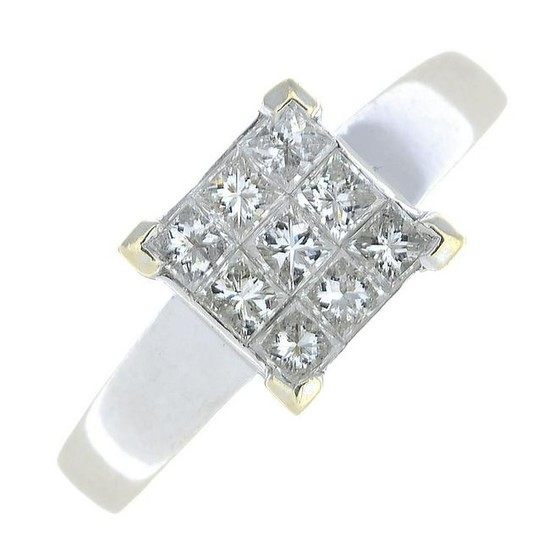 A square-cut diamond ring.Total diamond weight 0.50ct