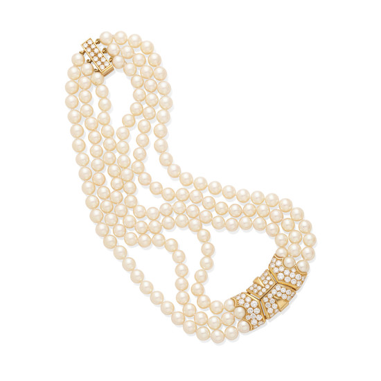 A triple strand cultured pearl necklace