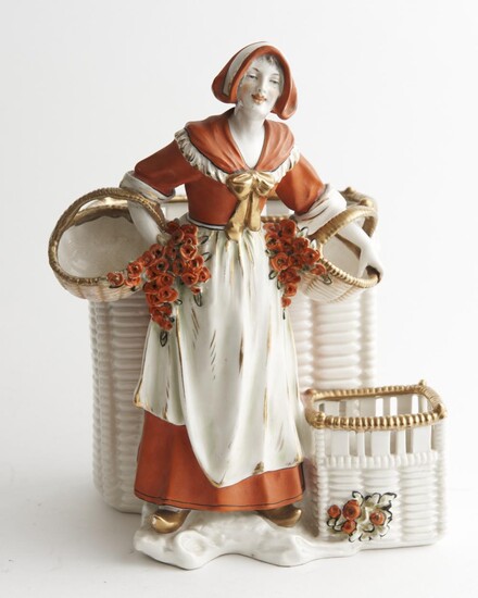 AN AMPHORA FIGURE OF A WOMAN WITH A BASKET IN EACH HAND, RESTORED, H.28CM, LEONARD JOEL LOCAL DELIVERY SIZE: SMALL