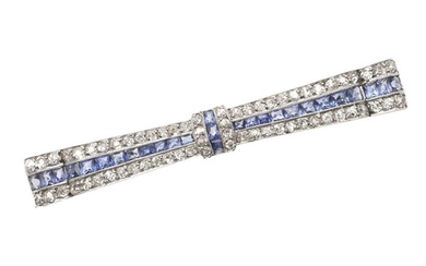 AN ART DECO SAPPHIRE AND DIAMOND BOW BROOCH. the stylised bo...