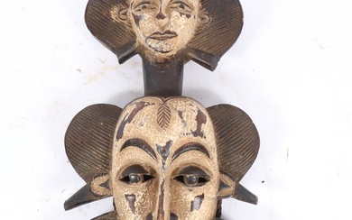 African Igbo janiform two face carved and polychrome tribal ceremonial mask, Nigeria. 17 3/4"H x 10