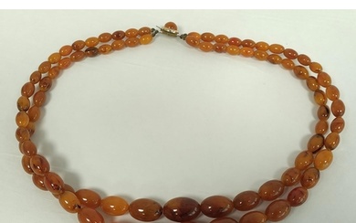 Amber graduated two row necklace, uncertified, 92g.