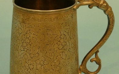 An Eastern Silver Coloured Metal Tankard having scroll and...