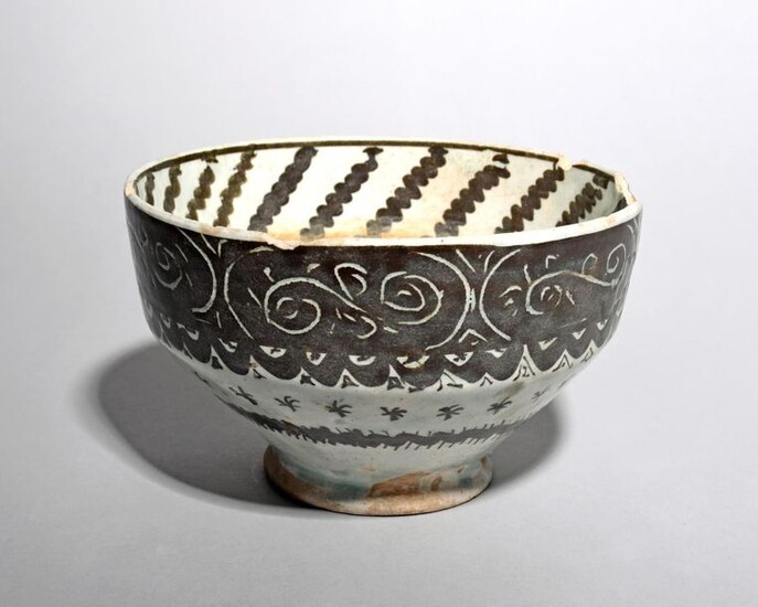 An Islamic pottery bowl probably 19th century, of...