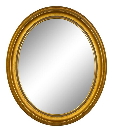 An Oval Giltwood Mirror Height 24 1/4 x width 20 1/2