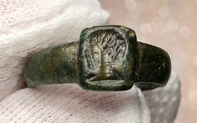 Ancient Roman Bronze Seal Ring with a male Head with a portrait Characteristics of Julio-Claudian Dynasty.