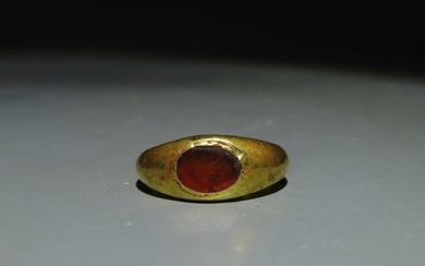 Ancient Roman Gold Ring with a garnet. 1st - 3rd century AD. 2.2 cm L. Spanish Import License.