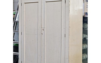 Antique painted pine wardrobe, twin doors enclosing a fitted...