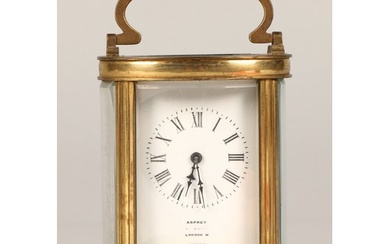 Asprey brass carriage clock, 13cm high.