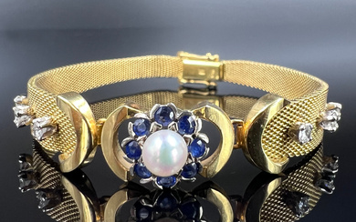 Bracelet. 750 yellow gold with diamonds, sapphires and a pearl.