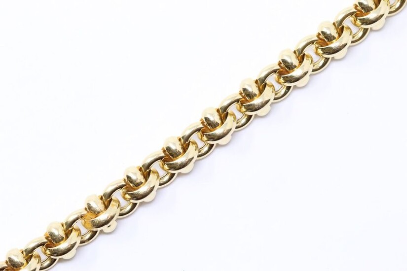 Bracelet en or jaune 18K (750) articulé d'anneaux...