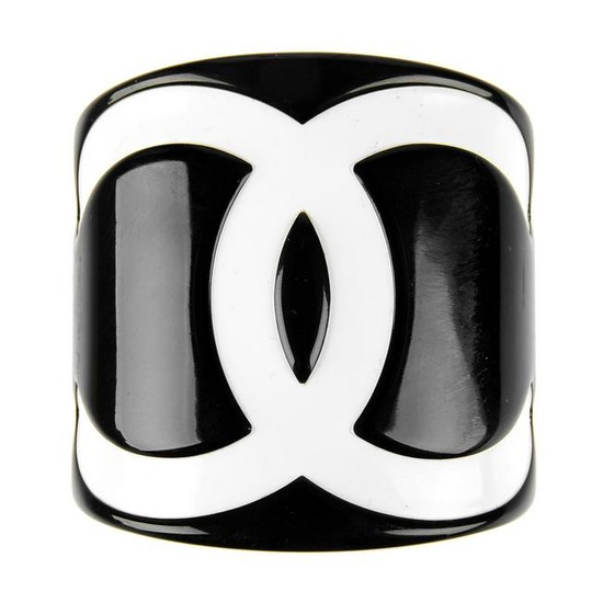 CHANEL - a Resin CC Cuff bracelet. The open cuff is