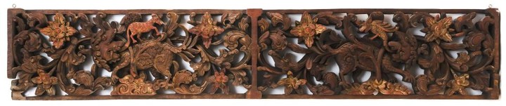 CHINESE CARVED WOOD PANEL Openwork carved dog-like creatures amongst scrolling vines, accented by red and gilt flowers and small cre...