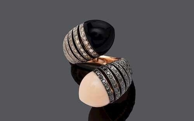 CORAL, ONYX AND DIAMOND RING.