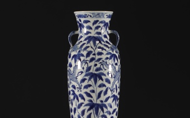 China - A blue-white porcelain vase decorated with dragons, Qing...