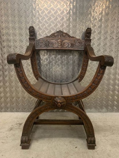Dagobert chair with carving of lion heads - Empire - Wood- Oak