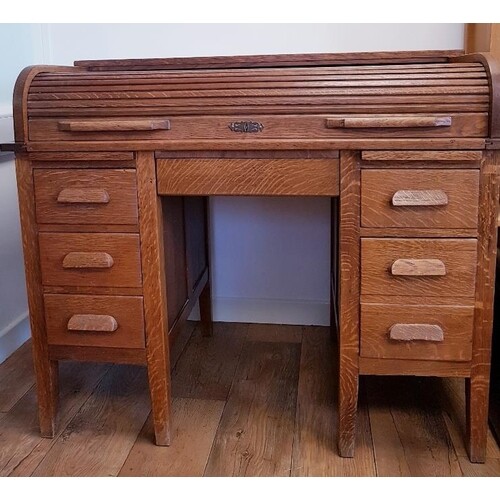 Early 20th Century oak roll top desk flanked by two sets of ...