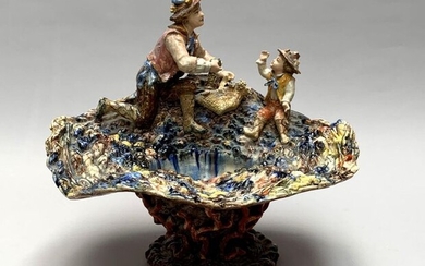 Important Earthenware fruit bowl with polychrome decoration of a winegrower...